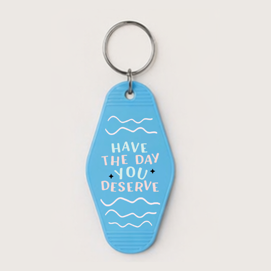 Have The Day You Deserve Motel Keychain